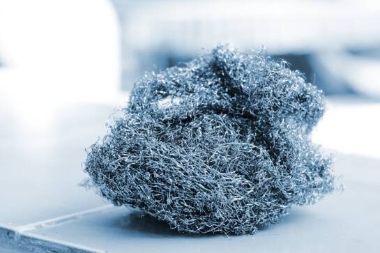 A giant ball of steel wool sitting on a counter