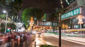 A shot of a busy street at night in Singapore